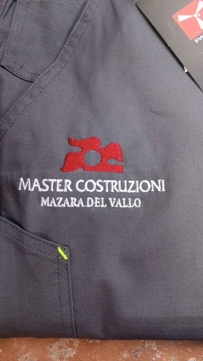 Ricamo Master Costruzioni su camicia
